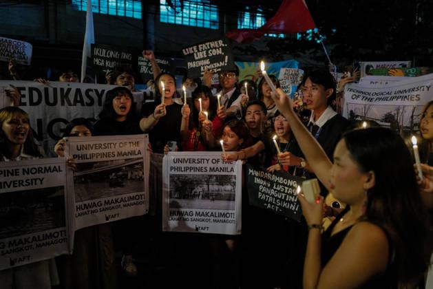 September 18, 2026, Philippines: Students from La Salle along with One Taft, a coalition of Taft-based schools, light candles to end the program of the Black Friday Protest on Friday at Taft Ave, Metro Manila. It coincided with the Black Friday Protests from different universities and a preparation for the mass movement on Sept. 21 for the Martial Law anniversary. Among the calls were for the alleged human rights abuses, corruption, and the Pax Silica initiative under the administration of President Ferdinand Marcos Jr. Philippines - ZUMAr240 20260918_zip_r240_048 Copyright: xMarcxDominicxRostratax