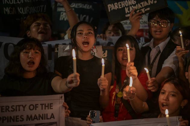 September 18, 2026, Philippines: Students from La Salle along with One Taft, a coalition of Taft-based schools, light candles to end the program of the Black Friday Protest on Friday at Taft Ave, Metro Manila. It coincided with the Black Friday Protests from different universities and a preparation for the mass movement on Sept. 21 for the Martial Law anniversary. Among the calls were for the alleged human rights abuses, corruption, and the Pax Silica initiative under the administration of President Ferdinand Marcos Jr. Philippines - ZUMAr240 20260918_zip_r240_014 Copyright: xMarcxDominicxRostratax