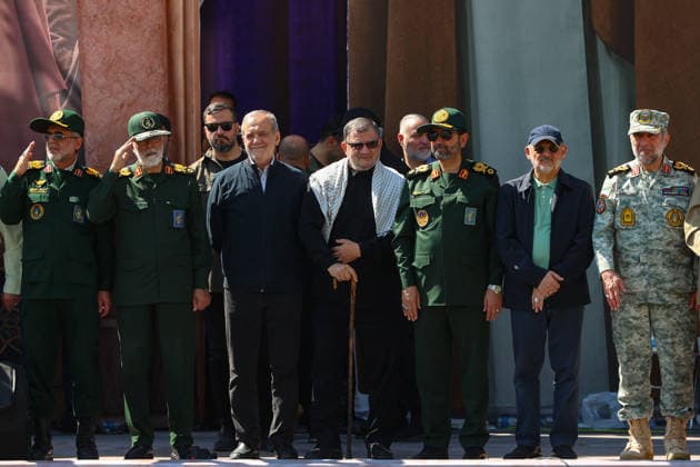 Iranians take to the streets of Tehran following US and Israeli attacks TEHRAN, IRAN - SEPTEMBER 18: (----EDITORIAL USE ONLY – MANDATORY CREDIT - IRANIAN PRESIDENCY HANDOUT - NO MARKETING NO ADVERTISING CAMPAIGNS - DISTRIBUTED AS A SERVICE TO CLIENTS----) Iranian President Masoud Pezeshkian (3rd L) attends as demonstrators fill the area between Imam Hossein Square and Revolution Square, carrying Hezbollah and Iranian flags and chanting slogans against the US and Israel in Tehran, Iran, on September 18, 2026. Iranians registered for the Self-Sacrifice campaign demonstrate under the leadership of the Basij Forces affiliated with the Islamic Revolutionary Guard Corps (IRGC) following US and Israeli attacks. Iranian Presidency Handout  Copyright: x2026xAnadoluxIranianxPresidencyx xHandoutx