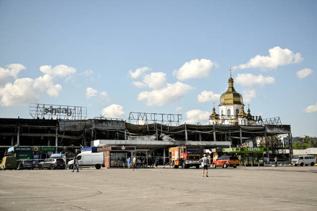The Church of St Nicholas towers behind the Amstor shopping centre in the Khortytskyi district, which burned down following a Russian drone attack, Zaporizhzhia, Ukraine, September 18, 2026. Rescuers extinguished a fire covering more than 10,000 square metres. Operations were hampered by the constant threat of repeated Russian strikes, forcing firefighters to retreat to shelters. The shopping centre was destroyed, and one person was injured.(Photo by Dmytro Smolienko Ukrinform) Russian army strikes shopping centre in Zaporizhzhia  Copyright: xDmytroxSmolienkox
