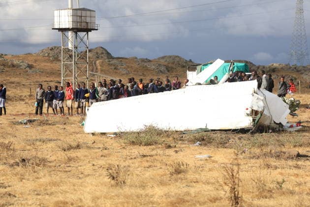 Training aircraft crashes in Kenya, two people lose their lives KAJIADO, KENYA - SEPTEMBER 18: Students look at the scene as emergency teams inspect the crash site after a training aircraft crashes in Kipeto, Kajiado County, Kenya, on September 18, 2026. Two people lost ther lives in the crash. Lucas Mukasa Anadolu Kajiado Kenya. Editorial use only. Please get in touch for any other usage.  Copyright: x2026xAnadoluxLucasxMukasax