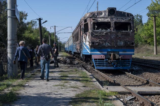Russians attack on a commuter passenger train in Kharkiv KHARKIV, UKRAINE - SEPTEMBER 18 Officials investigate the train following a Russian attack on a commuter passenger train at the Lypkuvativka railway station with a Geran-4 jet drone in Kharkiv, Ukraine on September 18, 2026. Eight people were injured and a 30-year-old passenger was killed. The attack caused a fire in two train cars. Serhii Masin Anadolu Kharkiv Ukraine. Editorial use only. Please get in touch for any other usage.  Copyright: x2026xAnadoluxSerhiixMasinx