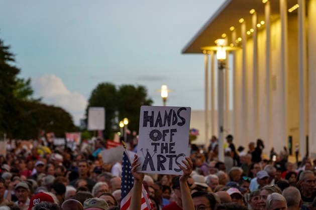 Demonstrators participate in the Hands Off the Arts Kennedy Center protest, objecting to President Donald Trump s call for the possibility of demolishing the Kennedy Center at the John F. Kennedy Center for the Performing Arts on Friday, September 18, 2026 in Washington DC. Several hundreds of activists held signs and walked the premises calling for President Trump to be removed as the chairman of the Kennedy Center.  WAP20260918919 LeighxVogel
