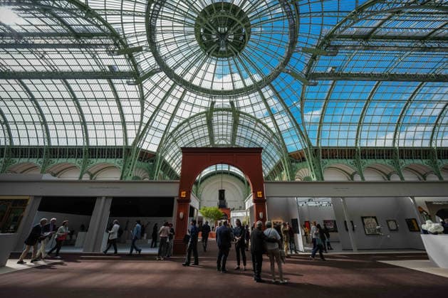 (260919) -- PARIS, Sept. 19, 2026 -- People visit Fine Arts Paris during a press tour at the Grand Palais in Paris, France, Sept. 18, 2026. Fine Arts Paris, formerly FAB Paris, opens to the public from Sept. 19 to 23, bringing together leading galleries and collectors from France and around the world. (Photo by Xinhua) FRANCE-PARIS-FINE ARTS PARIS AurelienxMorissard 
