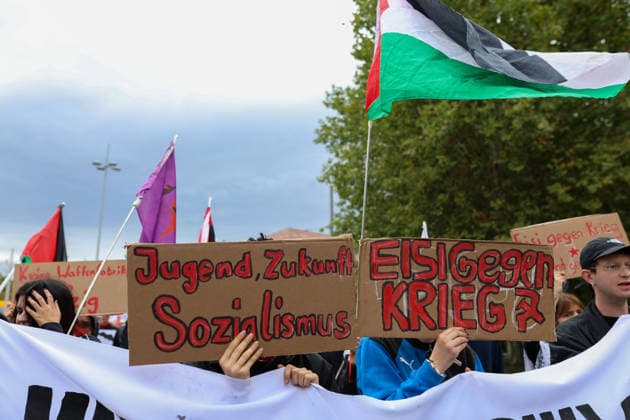 September 19, 2026, Leipzig, Saxony, Germany: Protesters take part in a demonstration against plans by US defense company Covenant to establish a missile production facility in the Leipzig region. The demonstration, organized by the alliance Ã¢â‚¬oeKeine Raketenfabrik in LeipzigÃ¢â‚¬Â (No Missile Factory in Leipzig), began at Augustusplatz in central Leipzig and called for the planned production of long-range Anthem cruise missiles to be stopped. Covenant plans to begin production in the Leipzig area in 2027. Protesters carried banners and placards calling for peace, disarmament and civilian employment instead of arms production. Leipzig Germany - ZUMAc291 20260919_zip_c291_011 Copyright: xMariaxCastrox