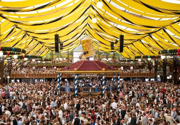 (260919) -- MUNICH, Sept. 19, 2026 -- People enjoy beer at the Oktoberfest in Munich, Germany, Sept. 19, 2026. The 191st Oktoberfest, one of the largest folk festivals in Germany, opened on Saturday in Munich, with mayor Dominik Krause tapping the first barrel of beer as a tradition. This year s festival will last until Oct. 4. ) GERMANY-MUNICH-OKTOBERFEST-OPENING ZhangxHaofu 