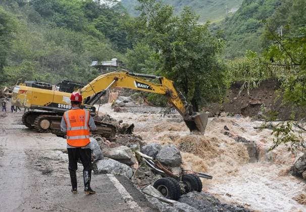 (260920) -- YANBIAN, Sept. 20, 2026 -- Rescuers clear the waterway at the site of a mudslide in Yanbian County, southwest China s Sichuan Province, Sept. 20, 2026. Two people have been found dead and three others are missing after a mudslide hit southwest China s Sichuan Province early Saturday, local authorities said. The mudslide occurred near Zhiliuhe Village in Yanbian County, Panzhihua City. The provincial emergency management department has dispatched a working team to the scene to guide rescue efforts. ) (SpotNews) CHINA-SICHUAN-YANBIAN-MUDSLIDE-RESCUE (CN) LiuxKun 