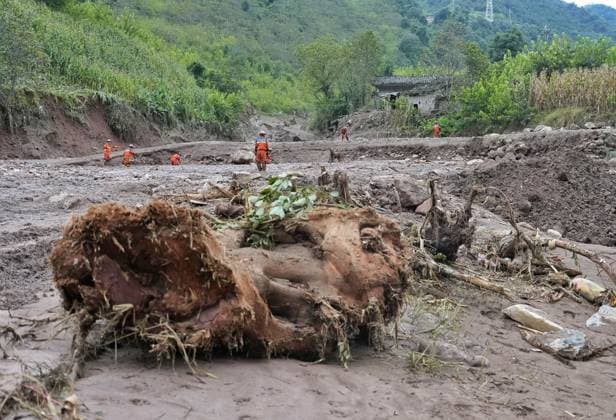 (260920) -- YANBIAN, Sept. 20, 2026 -- Rescuers work at the site of a mudslide in Yanbian County, southwest China s Sichuan Province, Sept. 20, 2026. Two people have been found dead and three others are missing after a mudslide hit southwest China s Sichuan Province early Saturday, local authorities said. The mudslide occurred near Zhiliuhe Village in Yanbian County, Panzhihua City. The provincial emergency management department has dispatched a working team to the scene to guide rescue efforts. ) (SpotNews) CHINA-SICHUAN-YANBIAN-MUDSLIDE-RESCUE (CN) LiuxKun 