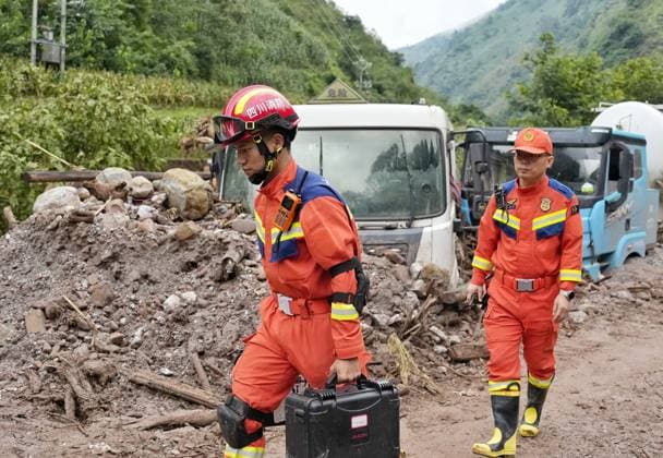 (260920) -- YANBIAN, Sept. 20, 2026 -- Rescuers work at the site of a mudslide in Yanbian County, southwest China s Sichuan Province, Sept. 20, 2026. Two people have been found dead and three others are missing after a mudslide hit southwest China s Sichuan Province early Saturday, local authorities said. The mudslide occurred near Zhiliuhe Village in Yanbian County, Panzhihua City. The provincial emergency management department has dispatched a working team to the scene to guide rescue efforts. ) (SpotNews) CHINA-SICHUAN-YANBIAN-MUDSLIDE-RESCUE (CN) LiuxKun 