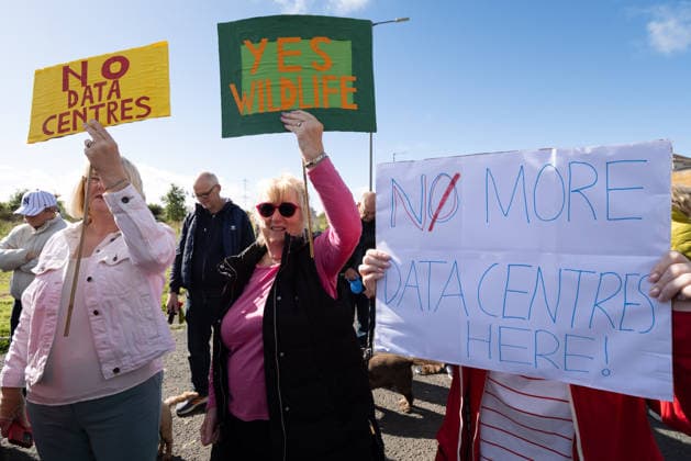 September 20, 2026, Chapelhall, Scotland, UK: Residents and their supporters opposed to plans for a hyperscale data centre in Chapelhall, North Lanarkshire, held a protest at the site of the proposed 24 acre development. They cite concerns that the 100MW development, which could eventually form part of a larger 500MW AI Growth Zone in the area, will have negative impacts on local traffic, noise levels, energy infrastructure and wildlife habitat. Chapelhall UK - ZUMAs357 20260920_zip_s357_008 Copyright: xCameronxScottx