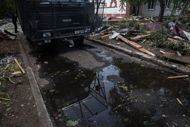 September 20, 2026, Kramatorsk, Donetsk, Ukraine: Image of the reflection in a puddle of a firetruck equipped with FPV drone protection at a school destroyed by a Russian airstrike that was serving as an evacuation center in Kramatorsk. Kramatorsk Ukraine  - ZUMAb286 20260920_zip_b286_034 Copyright: xFranciscoxRichartx