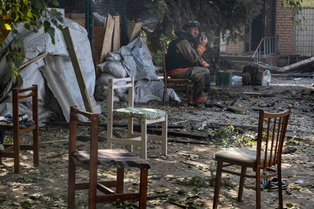 September 20, 2026, Kramatorsk, Donetsk, Ukraine: A firefighter takes a break after working at a school destroyed by a Russian airstrike that was serving as an evacuation center in Kramatorsk. Kramatorsk Ukraine - ZUMAb286 20260920_zip_b286_031 Copyright: xFranciscoxRichartx