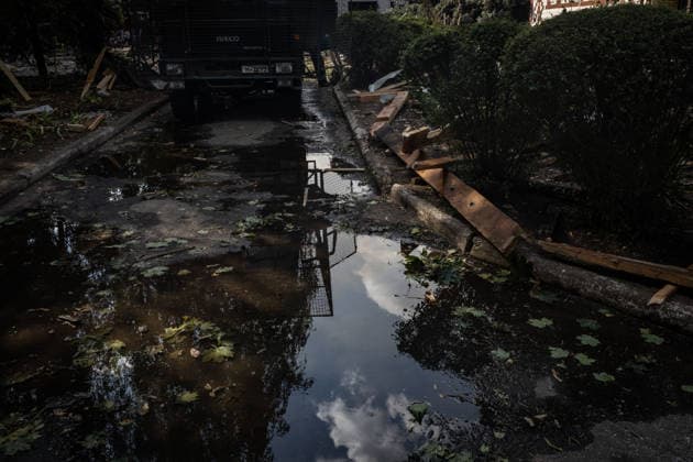 September 20, 2026, Kramatorsk, Donetsk, Ukraine: Image of the reflection in a puddle of a firetruck equipped with FPV drone protection at a school destroyed by a Russian airstrike that was serving as an evacuation center in Kramatorsk. Kramatorsk Ukraine - ZUMAb286 20260920_zip_b286_032 Copyright: xFranciscoxRichartx