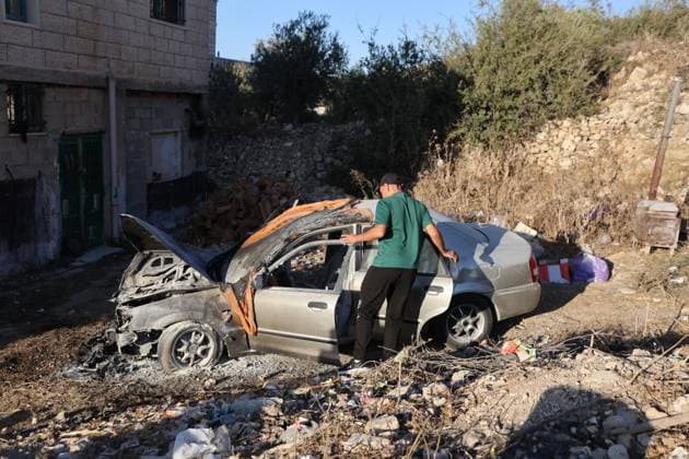 September 20, 2026, Hebron, Palestine, State of: BEIT UMMAR, HEBRON, OCCUPIED WEST BANK, SEPTEMBER 20, 2026: Burned vehicles are seen following an attack by Israeli settlers in the town of Beit Ummar, north of Hebron. According to local sources, a Palestinian woman was injured and five vehicles were set on fire during the attack. Hebron Palestine, State of - ZUMAq101 20260920_zna_q101_078 Copyright: xMosabxShawerx