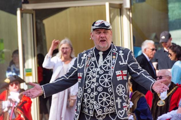 September 20, 2026, London, London, England: Pearly Kings and QueenÃ¢â‚¬â ¢s of London gather with city Mayors, Chelsea pensioner war veterans and dignitaries at Guildhall Yard for the annual Costermongers Harvest Festival celebration. Morris dancers and choirs performed along with the Pearly Kings and Queens who led a sing-a-long of traditional favourite songs such as: Ã¢â‚¬ËœKnees up Mother BrownÃ¢â‚¬â ¢ and Ã¢â‚¬ËœDoing the Lambeth walkÃ¢â‚¬â ¢. A procession followed to the spiritual home of LondonÃ¢â‚¬â ¢s Ã¢â‚¬ËœEastendersÃ¢â‚¬â ¢ at St Mary-le-Bow Church. Tradition has it that anyone born within earshot of the Bow Bells can claim to be a true Cockney. The march was led by a pearly prince carrying a plaited loaf of bread that was prese - ZUMAr169 20260920_zip_r169_006 Copyright: xRodxHarbinsonx