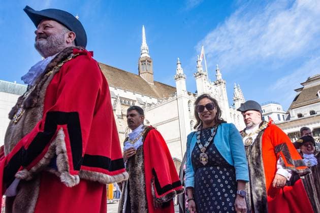 September 20, 2026, London, London, England: Pearly Kings and QueenÃ¢â‚¬â ¢s of London gather with city Mayors, Chelsea pensioner war veterans and dignitaries at Guildhall Yard for the annual Costermongers Harvest Festival celebration. Morris dancers and choirs performed along with the Pearly Kings and Queens who led a sing-a-long of traditional favourite songs such as: Ã¢â‚¬ËœKnees up Mother BrownÃ¢â‚¬â ¢ and Ã¢â‚¬ËœDoing the Lambeth walkÃ¢â‚¬â ¢. A procession followed to the spiritual home of LondonÃ¢â‚¬â ¢s Ã¢â‚¬ËœEastendersÃ¢â‚¬â ¢ at St Mary-le-Bow Church. Tradition has it that anyone born within earshot of the Bow Bells can claim to be a true Cockney. The march was led by a pearly prince carrying a plaited loaf of bread that was prese - ZUMAr169 20260920_zip_r169_010 Copyright: xRodxHarbinsonx