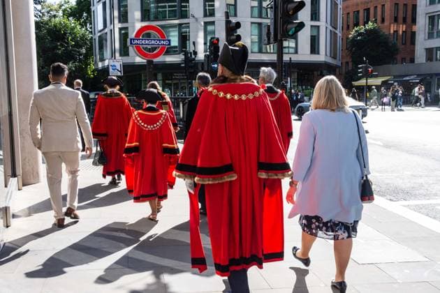September 20, 2026, London, London, England: Pearly Kings and QueenÃ¢â‚¬â ¢s of London gather with city Mayors, Chelsea pensioner war veterans and dignitaries at Guildhall Yard for the annual Costermongers Harvest Festival celebration. Morris dancers and choirs performed along with the Pearly Kings and Queens who led a sing-a-long of traditional favourite songs such as: Ã¢â‚¬ËœKnees up Mother BrownÃ¢â‚¬â ¢ and Ã¢â‚¬ËœDoing the Lambeth walkÃ¢â‚¬â ¢. A procession followed to the spiritual home of LondonÃ¢â‚¬â ¢s Ã¢â‚¬ËœEastendersÃ¢â‚¬â ¢ at St Mary-le-Bow Church. Tradition has it that anyone born within earshot of the Bow Bells can claim to be a true Cockney. The march was led by a pearly prince carrying a plaited loaf of bread that was prese - ZUMAr169 20260920_zip_r169_015 Copyright: xRodxHarbinsonx