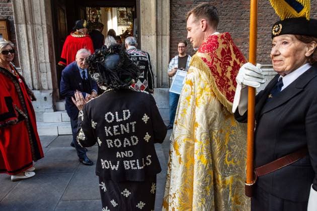September 20, 2026, London, London, England: Pearly Kings and QueenÃ¢â‚¬â ¢s of London gather with city Mayors, Chelsea pensioner war veterans and dignitaries at Guildhall Yard for the annual Costermongers Harvest Festival celebration. Morris dancers and choirs performed along with the Pearly Kings and Queens who led a sing-a-long of traditional favourite songs such as: Ã¢â‚¬ËœKnees up Mother BrownÃ¢â‚¬â ¢ and Ã¢â‚¬ËœDoing the Lambeth walkÃ¢â‚¬â ¢. A procession followed to the spiritual home of LondonÃ¢â‚¬â ¢s Ã¢â‚¬ËœEastendersÃ¢â‚¬â ¢ at St Mary-le-Bow Church. Tradition has it that anyone born within earshot of the Bow Bells can claim to be a true Cockney. The march was led by a pearly prince carrying a plaited loaf of bread that was prese - ZUMAr169 20260920_zip_r169_022 Copyright: xRodxHarbinsonx