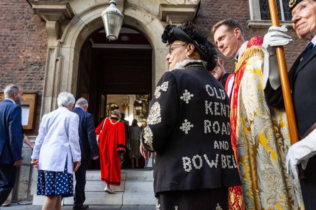 September 20, 2026, London, London, England: Pearly Kings and QueenÃ¢â‚¬â ¢s of London gather with city Mayors, Chelsea pensioner war veterans and dignitaries at Guildhall Yard for the annual Costermongers Harvest Festival celebration. Morris dancers and choirs performed along with the Pearly Kings and Queens who led a sing-a-long of traditional favourite songs such as: Ã¢â‚¬ËœKnees up Mother BrownÃ¢â‚¬â ¢ and Ã¢â‚¬ËœDoing the Lambeth walkÃ¢â‚¬â ¢. A procession followed to the spiritual home of LondonÃ¢â‚¬â ¢s Ã¢â‚¬ËœEastendersÃ¢â‚¬â ¢ at St Mary-le-Bow Church. Tradition has it that anyone born within earshot of the Bow Bells can claim to be a true Cockney. The march was led by a pearly prince carrying a plaited loaf of bread that was prese - ZUMAr169 20260920_zip_r169_023 Copyright: xRodxHarbinsonx