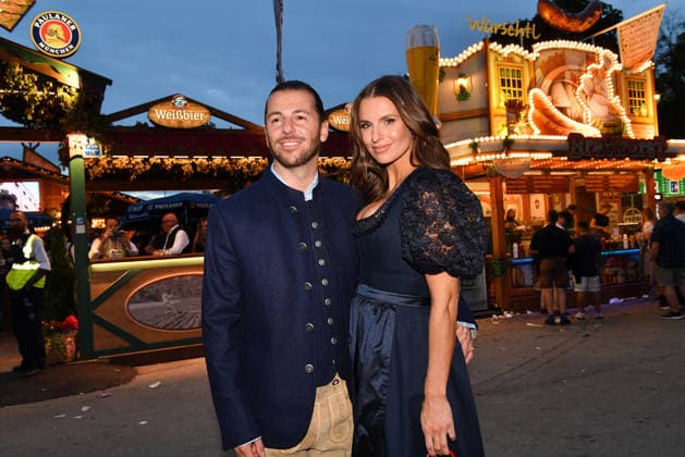Riccardo Basile and Laura Wontorra during the 2026 Oktoberfest in front of the Almauftrieb at Theresienwiese on September 20, 2026 in Munich, Germany Oktoberfest - the Almauftrieb at Theresienwiese in Munich, Germany
