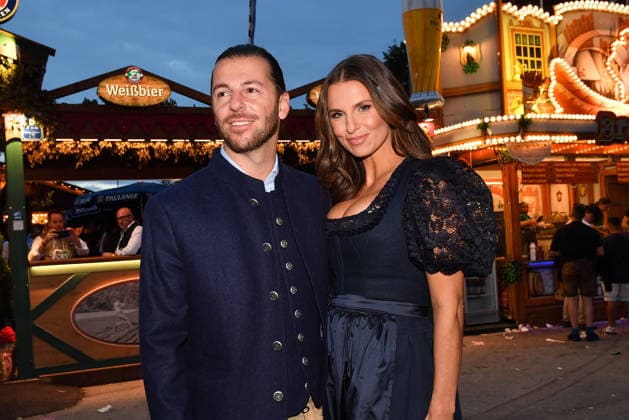 Riccardo Basile and Laura Wontorra during the 2026 Oktoberfest in front of the Almauftrieb at Theresienwiese on September 20, 2026 in Munich, Germany Oktoberfest - the Almauftrieb at Theresienwiese in Munich, Germany