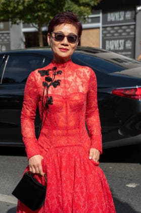 Attendees arrive at the Erderm Catwalk Show London, UK - 20 Sept 2026 An attendee arrives wearing a red dress and carrying a black handbag at the Erdem catwalk show, held at the Roundhouse in Camden, London, as part of London Fashion Week 2026. Models and members of the fashion industry gather at the Roundhouse in Camden, London, for the Erdem catwalk show during London Fashion Week 2026. The event forms part of the official London Fashion Week schedule, bringing together models, designers, fashion professionals, media and guests for the presentation of Erdem s latest collection. London United Kingdom Copyright: xJamesxWilloughbyx xSOPAxImagesx JWILLOUGHBY_3467