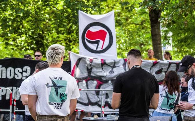 September 20, 2026, Munich, Bavaria, Germany: Coinciding with Oktoberfest, a group of right-extremists from the Identitaere Bewegung held a rally under the Banner of the Save Europe Act which includes, according to them, guidelines for the so-called Remigration. Some members discussed Remigration to include non-native born Germans, as they feel they can never be German, even if they hit all integration points. Critics in Germany see it as eyebrow-raising that the Identitaere leader, Martin Sellner, is an Austrian that is essentially making German policy and can play a greater role in government should the AfD take power. Munich Germany - ZUMAb160 20260920_abp_b160_032 Copyright: xSachellexBabbarx