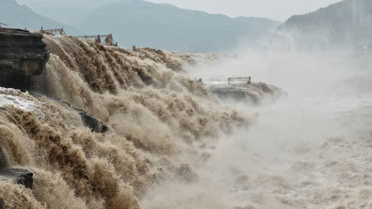 YAN AN, CHINA - SEPTEMBER 20: The water volume of the Hukou Waterfall on the Yellow River rises significantly due to sediment discharge and flood release from upstream reservoirs on September 20, 2026 in Yan an, Shaanxi Province of China. The surge created a landscape where water levels on both banks are equal with twin waterfalls rushing forward.  Copyright: xVCGx 111668265437