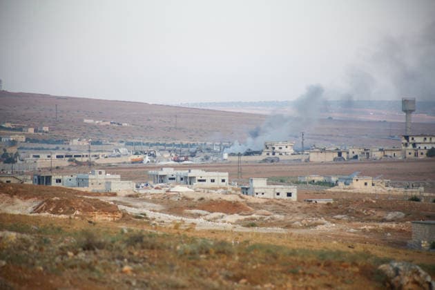 4 injured in powerful explosions at Syrian army military facility in Aleppo countryside ALEPPO, SYRIA - SEPTEMBER 21: Smoke rise from a Syrian army military site following severe explosions in the Al-Hadaba area, west of Al-Eis town in southwestern Aleppo province, Syria, on September 21, 2026. Initial reports confirm at least four people were injured in the blasts, which triggered a series of secondary detonations and sent heavy plumes of smoke across surrounding agricultural areas. Kasim Yusuf Anadolu Aleppo Syria. Editorial use only. Please get in touch for any other usage.  Copyright: x2026xAnadoluxKasimxYusufx