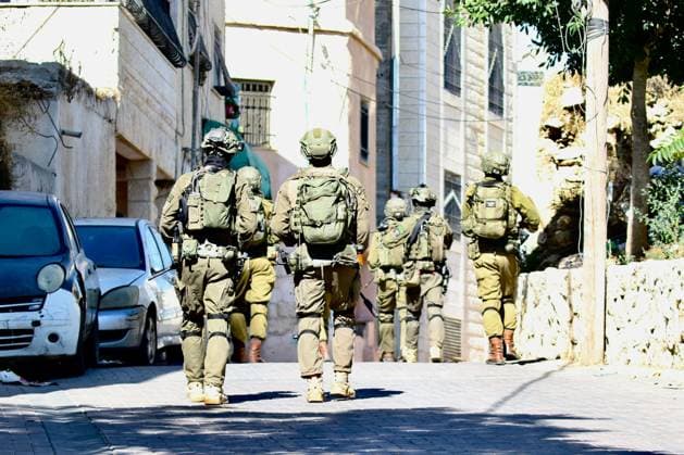 Israeli Forces Started Large-Scale Military Operation In Biddu BIDU, PALESTINE SEPTEMBER 21, 2026: Israeli forces continued a large-scale military operation in the town of Biddu, northwest of occupied Jerusalem, with raids on homes, searches, arrests and field interrogations. The operation began at around 1:00 AM, according to local sources. Israeli forces raided the home of a Palestinian man accused of carrying out the Nabi Saleh attack, taking measurements and digging into parts of the walls in preparation for a possible demolition or explosion, according to local reports. His family home was also raided, and his father and other family members were detained. Israeli forces also seized a house belonging to a resident and converted it Copyright: x xSalmanxMohsenxAlkhatibx xJNAxPressx