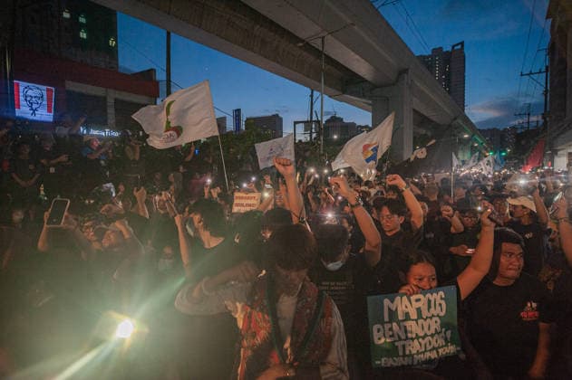 September 21, 2026, Quezon City, Quezon, Philippines: Thousands of Filipinos and various progressive groups from multiple sectors protested through the streets of Manila until Recto Ave, commemorating 54 years since the decalaration of Martial Law by late President Marcos Sr, father of current president Marcos Jr. The protesters were stopped at by the Philippine National Police s barricades. Quezon City Philippines - ZUMAy102 20260921_zip_y102_011 Copyright: xKenosisxYapx