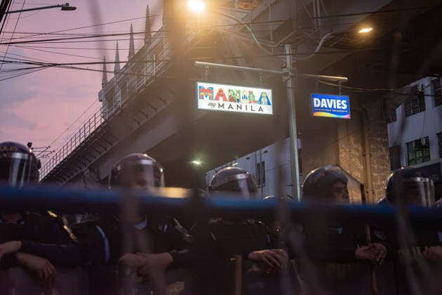 September 21, 2026, Quezon City, Quezon, Philippines: Thousands of Filipinos and various progressive groups from multiple sectors protested through the streets of Manila until Recto Ave, commemorating 54 years since the decalaration of Martial Law by late President Marcos Sr, father of current president Marcos Jr. The protesters were stopped at by the Philippine National Police s barricades. Quezon City Philippines - ZUMAy102 20260921_zip_y102_016 Copyright: xKenosisxYapx