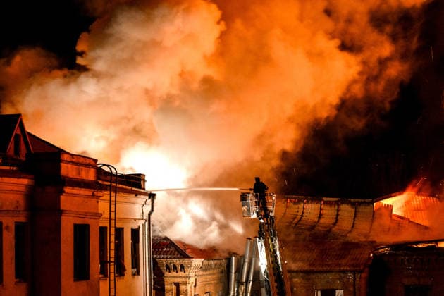 Historic Building of Zaporizhzhia National University Struck by Russian Army - Ukraine A rescuer uses an aerial work platform to extinguish a fire at Academic Building No. 3 of Zaporizhzhia National University, caused by an overnight Russian drone attack in the Oleksandrivskyi district of Zaporizhzhia, Ukraine, September 21, 2026. The building, a cultural heritage site and architectural monument of local significance, was formerly the Oleksandrivsk Girls? Gymnasium, built in 1902. A significant portion of the historic structure burned down in the attack. Buildings No. 4 and No. 5 also sustained damage, with windows shattered. The Russian strike additionally destroyed a shopping centre and damaged multi-storey residential blocks. Six people  Copyright: xSmoliyenkoxDmytro Ukrinform ABACAx