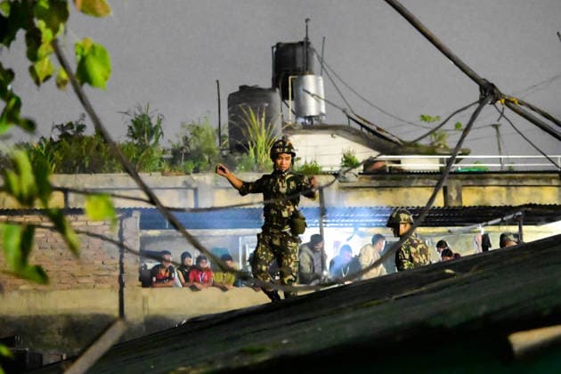 Nepal: Fire Breaks Out At Plastic Warehouse In Kathmandu Security personnel from the Nepal Army, Armed Police Force (APF) and Nepal Police, along with firefighters from Kathmandu Metropolitan City, work to extinguish a fire at a plastic warehouse near residential houses and the waste-management centre in Teku, Kathmandu, Nepal, on September 21, 2026. The fire broke out at a plastic warehouse in Kathmandu Metropolitan City-12, with firefighters, security personnel and local residents working to control the blaze. The cause of the fire and the extent of the damage were not immediately known. Kathmandu Bagmati Nepal  Copyright: xSafalxPrakashxShresthax originalFilename: shrestha-nepalfir260921_npBUC.jpg