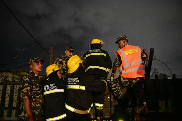 Nepal: Fire Breaks Out At Plastic Warehouse In Kathmandu Security personnel from the Nepal Army, Armed Police Force (APF) and Nepal Police, along with firefighters from Kathmandu Metropolitan City, work to extinguish a fire at a plastic warehouse near residential houses and the waste-management centre in Teku, Kathmandu, Nepal, on September 21, 2026. The fire broke out at a plastic warehouse in Kathmandu Metropolitan City-12, with firefighters, security personnel and local residents working to control the blaze. The cause of the fire and the extent of the damage were not immediately known. Kathmandu Bagmati Nepal  Copyright: xSafalxPrakashxShresthax originalFilename: shrestha-nepalfir260921_npSah.jpg
