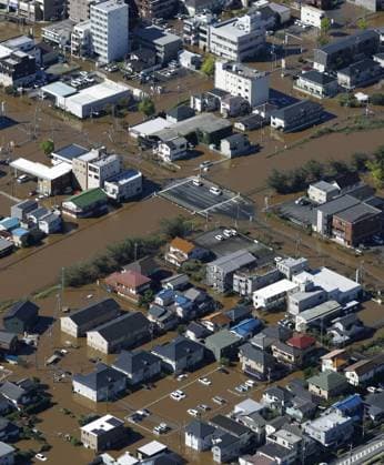 Aftermath of Typhoon Dujuan Photo taken on Sept. 22, 2026, from a Kyodo News helicopter shows a flooded residential area in Sakura in Chiba Prefecture, eastern Japan, following heavy rain caused by Typhoon Dujuan.  A14AA0005628213P