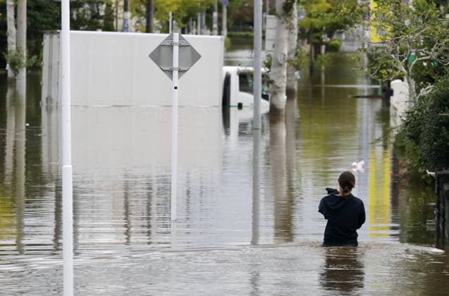 Aftermath of Typhoon Dujuan A street remains flooded in Sakura in Chiba Prefecture, eastern Japan, on Sept. 22, 2026, following heavy rain caused by Typhoon Dujuan.  A14AA0005628217P