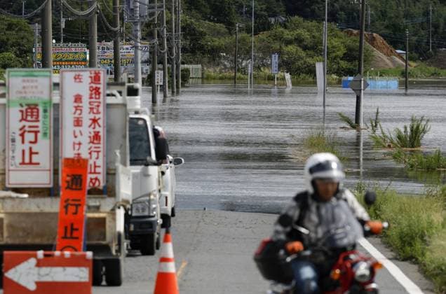Aftermath of Typhoon Dujuan A road remains partially flooded in Sakura in Chiba Prefecture, eastern Japan, on Sept. 22, 2026, following heavy rain caused by Typhoon Dujuan.  A14AA0005628219P