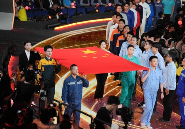 (260922) -- SHANGHAI, Sept. 22, 2026 -- The Chinese national flag is carried during the opening ceremony of the 48th WorldSkills Competition in east China s Shanghai, Sept. 22, 2026. The 48th WorldSkills Competition opened in Shanghai on Tuesday evening, with 1,385 competitors from 68 countries and regions vying in 64 skill events. ) CHINA-SHANGHAI-WORLDSKILLS COMPETITION-OPENING CEREMONY (CN) RenxPengfei 