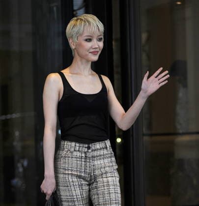 RECORD DATE NOT STATED IPA88837057 - Milan—photo by Mimmo Carriero—Chisa Kondou leaves the hotel to attend the Prada fashion show  Copyright: xx xx IPA88837057