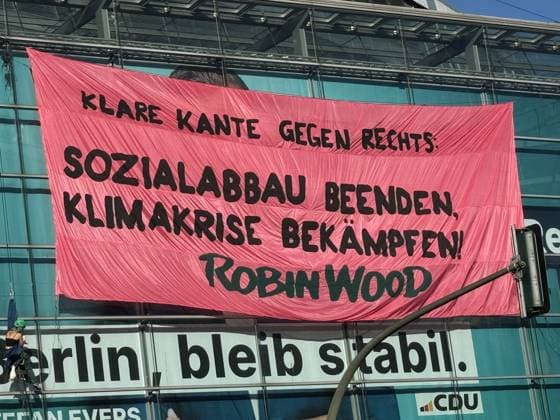 Environmental activists protest at CDU headquarters in Berlin BERLIN, GERMANY - SEPTEMBER 23: Environmental activists stage a protest at the Christian Democratic Union (CDU) headquarters as a banner reading KLARE KANTE GEGEN RECHTS - SOZIALABBAU BEENDEN, KLIMAKRISE BEKÄMPFEN! ( Take a clear stand against the right - end cuts to social welfare, fight the climate crisis! ) is displayed on the building facade in Berlin, Germany, on September 23, 2026. ROBIN WOOD activists climbed the CDU headquarters and unfurled the banner, criticizing the CDU-led federal government over what they described as insufficient action on climate protection and a lack of measures to counter the rise of the far-right Alternative for Germany (AfD). Cuneyt Karadag  Copyright: x2026xAnadoluxCuneytxKaradagx