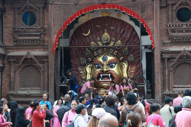 September 23, 2026, Kathmandu, Nepal: Nepali people gather to offer prayers to Swet Bhairav as it is opened for Indrajatra festival at Hanumandhoka Durbar Square in Kathmandu, Nepal on September 23, 2026. Nepali celebrate the Indra Jatra festival to worship Indra, the god of rain according to the Hindu myth and to mark the end of monsoon season. Kathmandu Nepal - ZUMAs233 20260923_zap_s233_013 Copyright: xSunilxSharmax