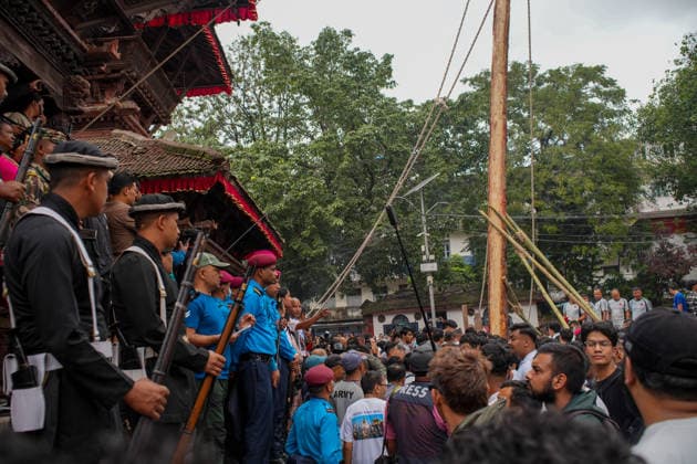 Indra Jatra Festival Started - Kathmandu Devotees erect the sacred ceremonial wooden pole known as Ya: Shi at Hanuman Dhoka Durbar Square, marking the beginning of the eight-day Indra Jatra festival in Kathmandu, Nepal, on September 23, 2026. The annual festival, one of the biggest celebrations in the Kathmandu Valley, is dedicated to Indra, the Hindu god of rain and heaven, and features traditional chariot processions, masked dances, religious rituals and cultural performances. The festival also includes processions of the living goddess Kumari through the historic streets of Kathmandu. Photo by Sunil Pradhan ABACAPRESS.COM Kathmandu Bagmati Nepal Copyright: xSuniixPradhan ABACAx