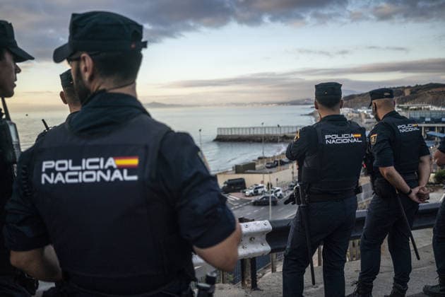 Spanish security forces reinforce Ceuta border amid mass crossing alerts CEUTA, SPAIN - SEPTEMBER 23: Members of the Spanish Civil Guard s Rapid Action Group (GRS) and National Police riot units maintain strict security vigilance along the Tarajal border crossing in the autonomous city of Ceuta, Spain on September 23, 2026. Following social media calls inciting a coordinated mass border-crossing attempt into European territory, the Spanish government deployed specialized reinforcement units from across mainland Spain to heighten border monitoring and prevent irregular entry attempts from neighboring Morocco amid the ongoing regional migration crisis. Jose Colon Anadolu Ceuta Spain. Editorial use only. Please get in touch for any other usa  Copyright: x2026xAnadoluxJosexColonx
