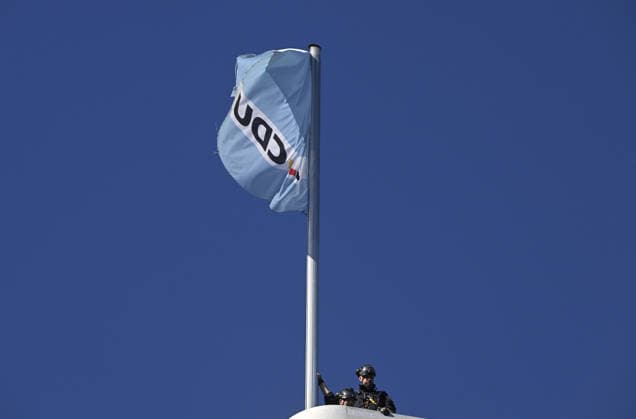 Environmental activists protest at CDU headquarters in Berlin BERLIN, GERMANY - SEPTEMBER 23: Police officers are seen on the roof of the Christian Democratic Union (CDU) headquarters during a protest by environmental group ROBIN WOOD in Berlin, Germany, on September 23, 2026.ROBIN WOOD activists climbed the CDU headquarters and unfurled the banner, criticizing the CDU-led federal government over what they described as insufficient action on climate protection and a lack of measures to counter the rise of the far-right Alternative for Germany (AfD). Halil Sagirkaya Anadolu Berlin Germany. Editorial use only. Please get in touch for any other usage.  Copyright: x2026xAnadoluxHalilxSagirkayax