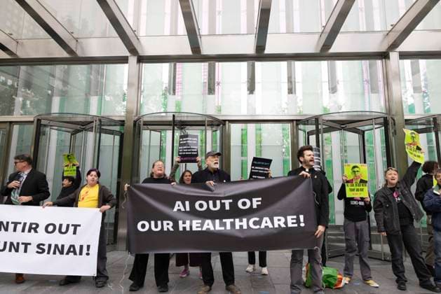 September 23, 2026, New York, New York, USA: ACT UP NY leads a coalition of organizations blockading the entrance to 1 WTC and later blocking traffic on the West Side Highway demonstrating under the banner AI OUT OF OUR HEALTHCARE! PALANTIR OUT OF MOUNT SINAI! as the Newsweek AI Health Summit is held inside the building and a keynote speaker is Dr. Brendan Carr, (not pictured) CEO of Mount Sinai. Approximately 20 protesters are arrested by NYPD. Part of the MONEY FOR AIDS and HEALTHCARE! NOT FOR ICE and WARFARE! ACT UP (AIDS Coalition To Unleash Power) campaign, demonstrators denounce Mount Sinai s contract with Palantir, a surveillance, data analytics and military tech company. New York USA  - ZUMAr174 20260923_znp_r174_001 Copyright: xGinaxMxRandazzox