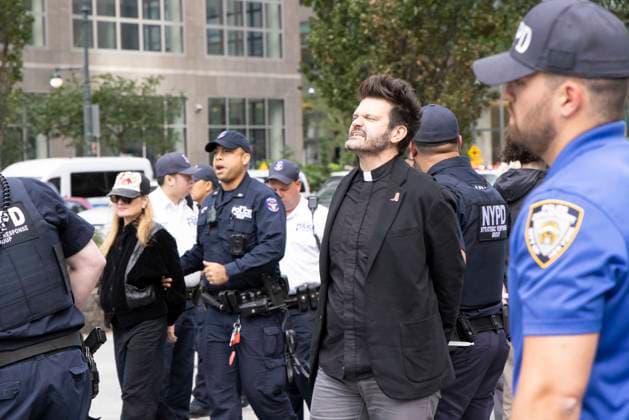 September 23, 2026, New York, New York, USA: Demonstrators are arrested by NYPD. ACT UP NY leads a coalition of organizations blockading the entrance to 1 WTC and later blocking traffic on the West Side Highway demonstrating under the banner AI OUT OF OUR HEALTHCARE! PALANTIR OUT OF MOUNT SINAI! as the Newsweek AI Health Summit is held inside the building and a keynote speaker is Dr. Brendan Carr, (not pictured) CEO of Mount Sinai. Part of the MONEY FOR AIDS and HEALTHCARE! NOT FOR ICE and WARFARE! ACT UP (AIDS Coalition To Unleash Power) campaign, demonstrators denounce Mount Sinai s contract with Palantir, a surveillance, data analytics and military tech company. Approximately 20 people are arrested. New York USA - ZUMAr174 20260923_znp_r174_044 Copyright: xGinaxMxRandazzox
