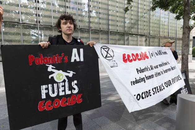 September 23, 2026, New York, New York, USA: ACT UP NY leads a coalition of organizations blockading the entrance to 1 WTC and later blocking traffic on the West Side Highway demonstrating under the banner AI OUT OF OUR HEALTHCARE! PALANTIR OUT OF MOUNT SINAI! as the Newsweek AI Health Summit is held inside the building and a keynote speaker is Dr. Brendan Carr, (not pictured) CEO of Mount Sinai. Approximately 20 protesters are arrested by NYPD. Part of the MONEY FOR AIDS and HEALTHCARE! NOT FOR ICE and WARFARE! ACT UP (AIDS Coalition To Unleash Power) campaign, demonstrators denounce Mount Sinai s contract with Palantir, a surveillance, data analytics and military tech company. Protesters hold banners that read Palantir s AI FUELS ECOCI  - ZUMAr174 20260923_znp_r174_037 Copyright: xGinaxMxRandazzox