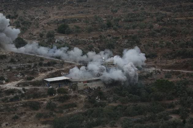 Israeli forces blow up Palestinian prisoner™s home near Nablus BEIT IMRIN, NABLUS, OCCUPIED WEST BANK, SEPTEMBER 24, 2026: Smoke rises after Israeli forces blew up the family home of Palestinian prisoner Dawas Hassoun in the village of Beit Imrin, northwest of Nablus. Israeli authorities accuse Hassoun, who has been detained since March, of carrying out a vehicle-ramming attack on March 21 that killed Israeli settler Yehuda Sherman. Residents were ordered to evacuate the house before the demolition, which also caused damage to neighboring property, according to local sources. NABLUS Palestine, State of Copyright: x xNedalxShtiehx xJNAxPressx