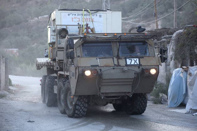Palestinian-Israeli conflict in Nablus - 24 Sep 2026 Israeli military vehicles withdraw after completing the demolition of the family home of Palestinian prisoner Dawas Hassoun. Israeli army forces demolished the family home of Palestinian prisoner Dawas Hassoun, who is accused of killing an Israeli settler, in the village of Beit Marin, northwest of Nablus in the West Bank. Nablus Palestine Copyright: xNasserxIshtayehx xSOPAxImagesx Nishtayeh574